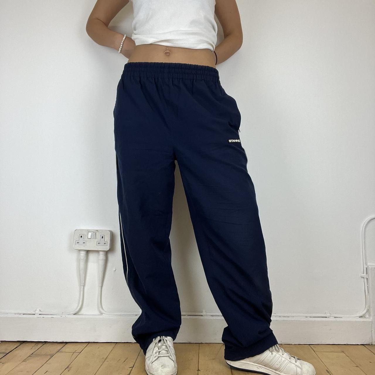 Vintage mens navy baggy tracksuit bottoms with white... - Depop