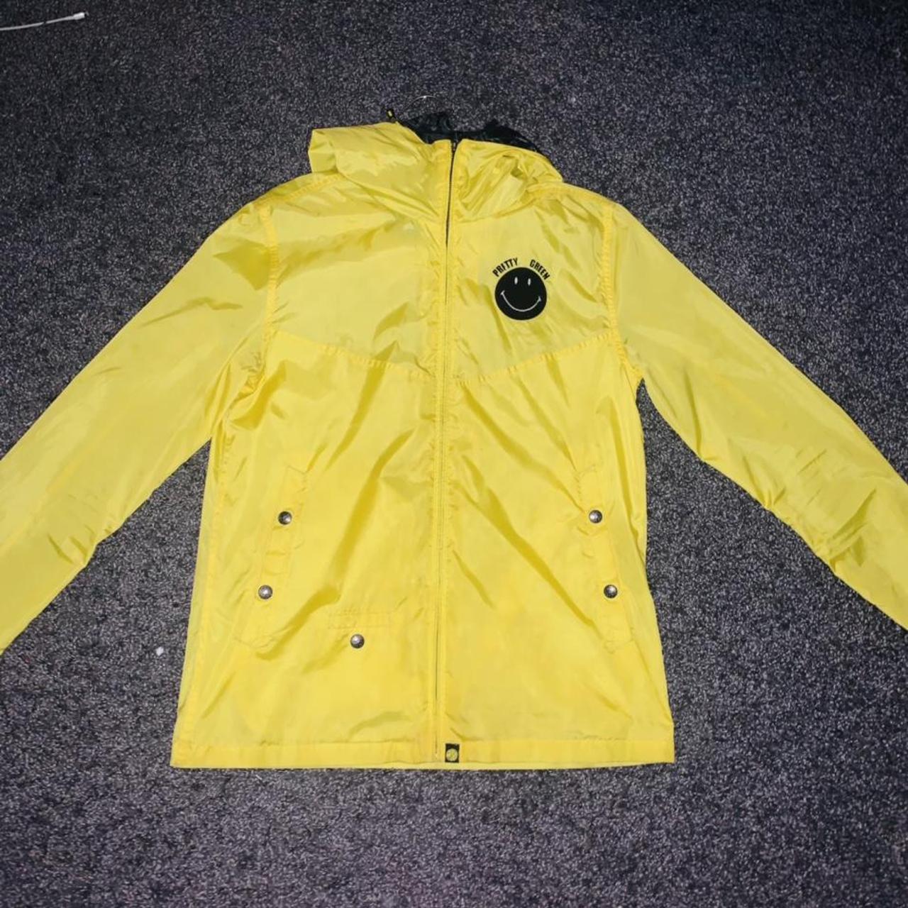 Bright yellow pretty green smily coat like new no. Depop