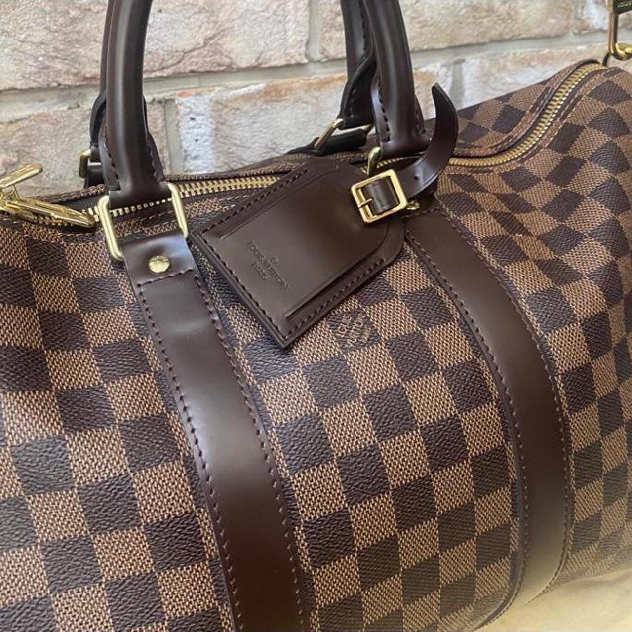 A Louis Vuitton Duffle bag. Used but in very good - Depop