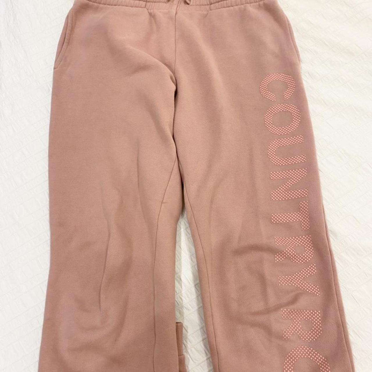 pink country road track pants worn but good... Depop