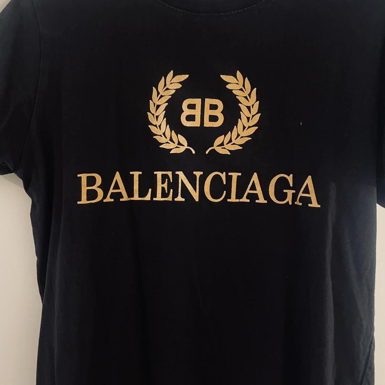 Black Balenciaga gold writing T-shirt Worn 2-3... - Depop
