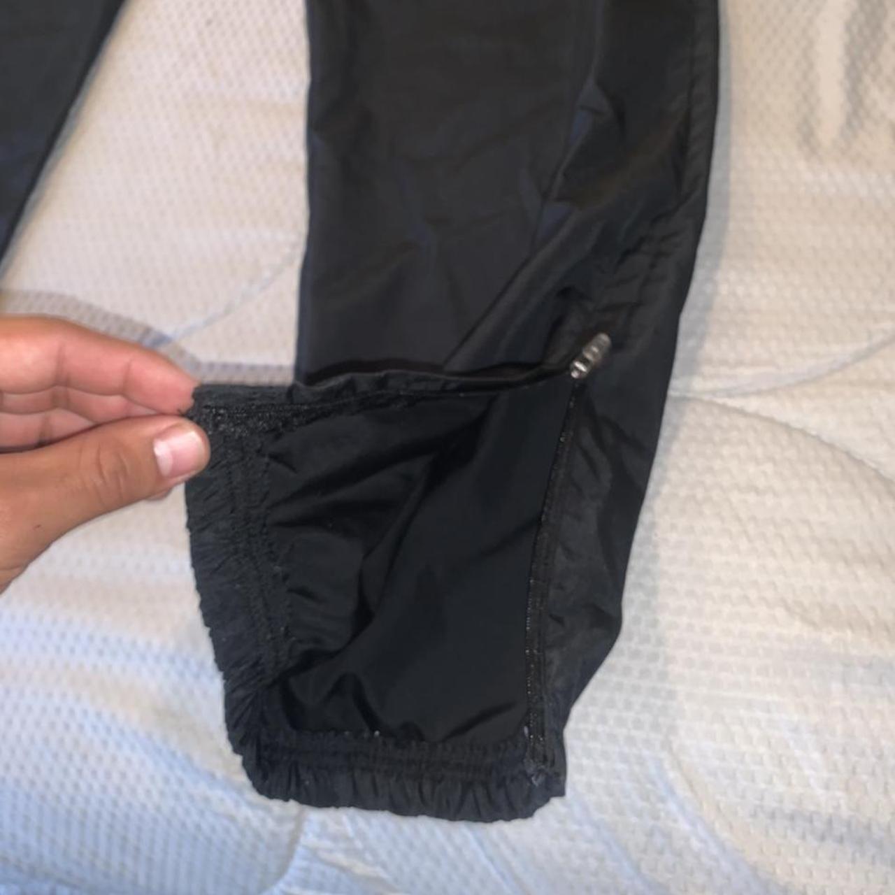 black windbreaker pants