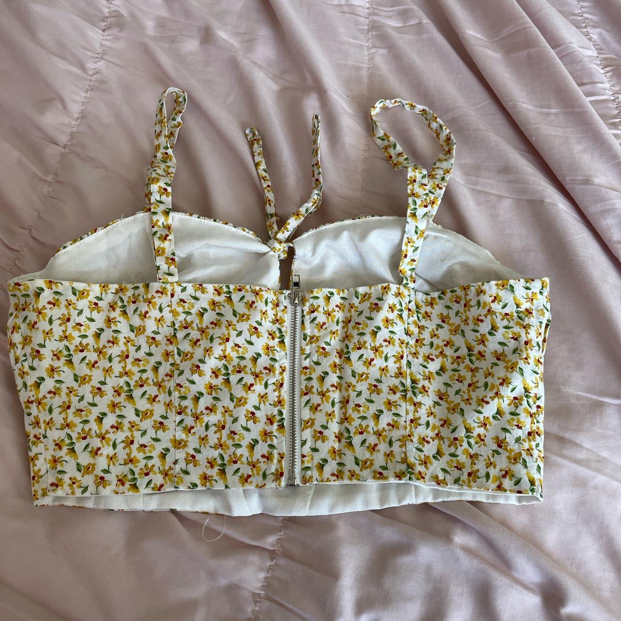 Really cute yellow floral corset top. I’ve never... Depop