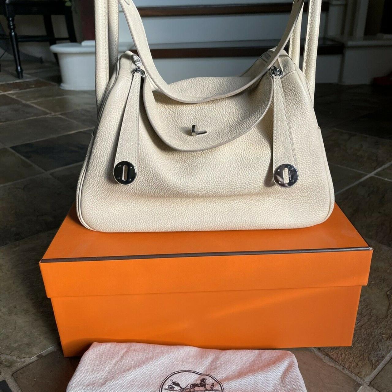 Hermes Lindy 30 rouge and gold color Taurillon - Depop