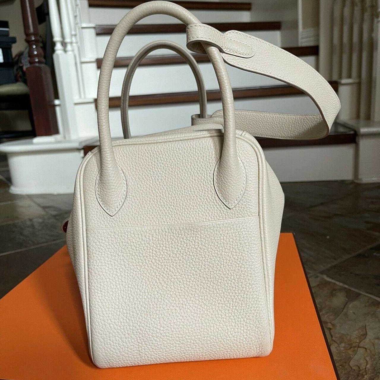 Hermes Lindy 30 rouge and gold color Taurillon - Depop