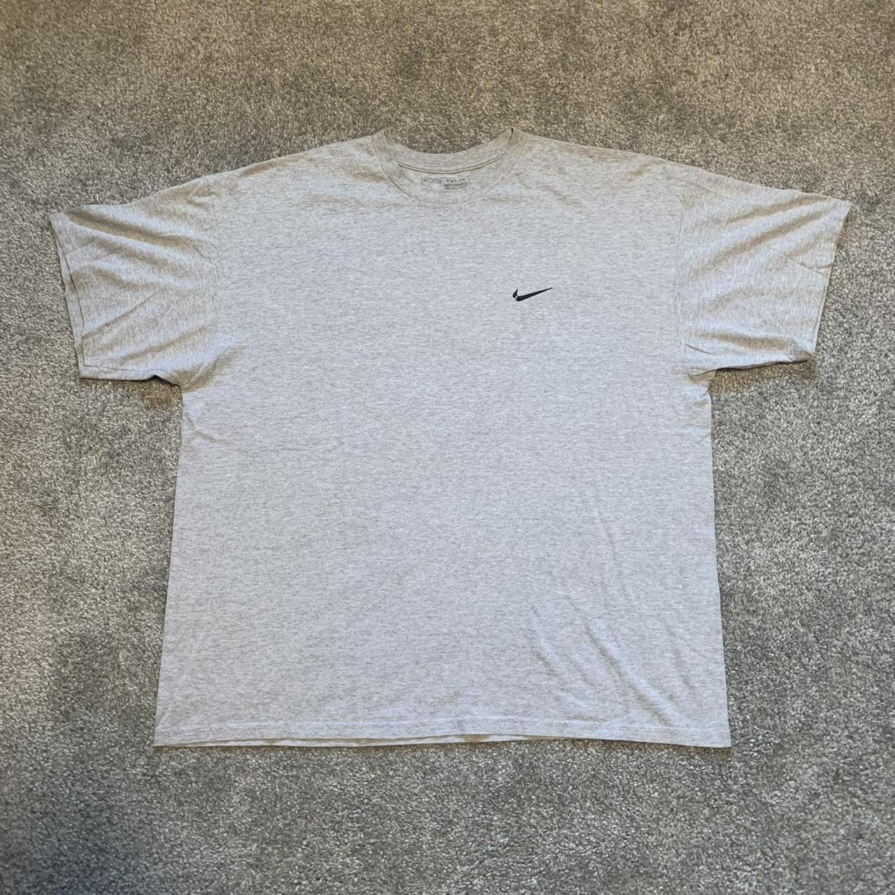 •Y2k gray Nike t-shirt on a screen printed tag. Only... | Depop