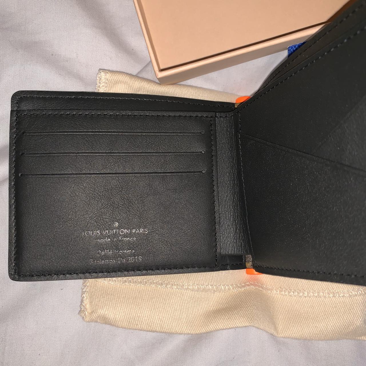 Vintage Louis Vuitton wallet. Front flap has curling - Depop