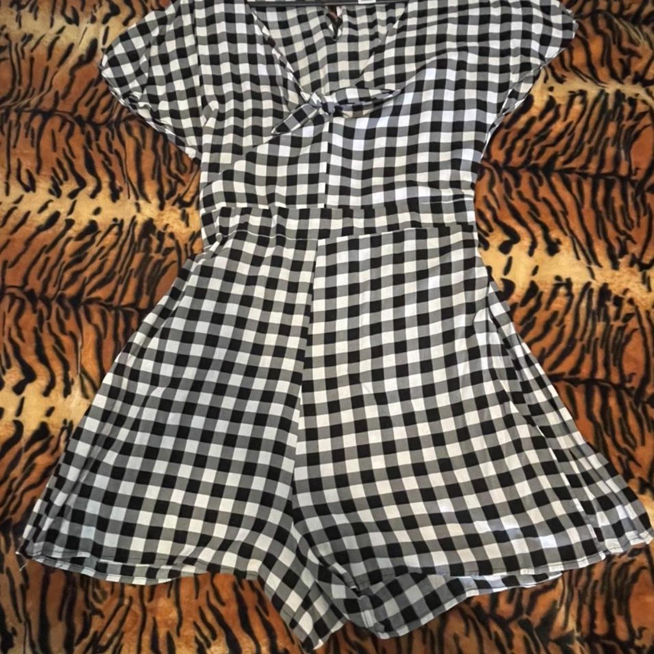 Playsuit from Kmart a couple years ago. Well loved. Depop