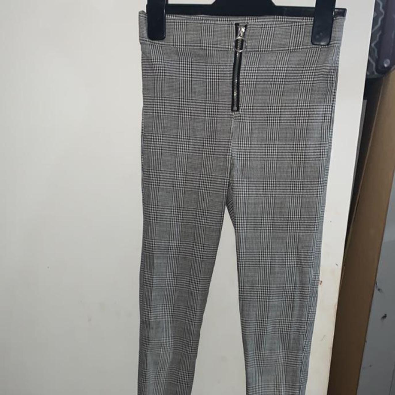 These are black-and-white chequered skinny pants - Depop