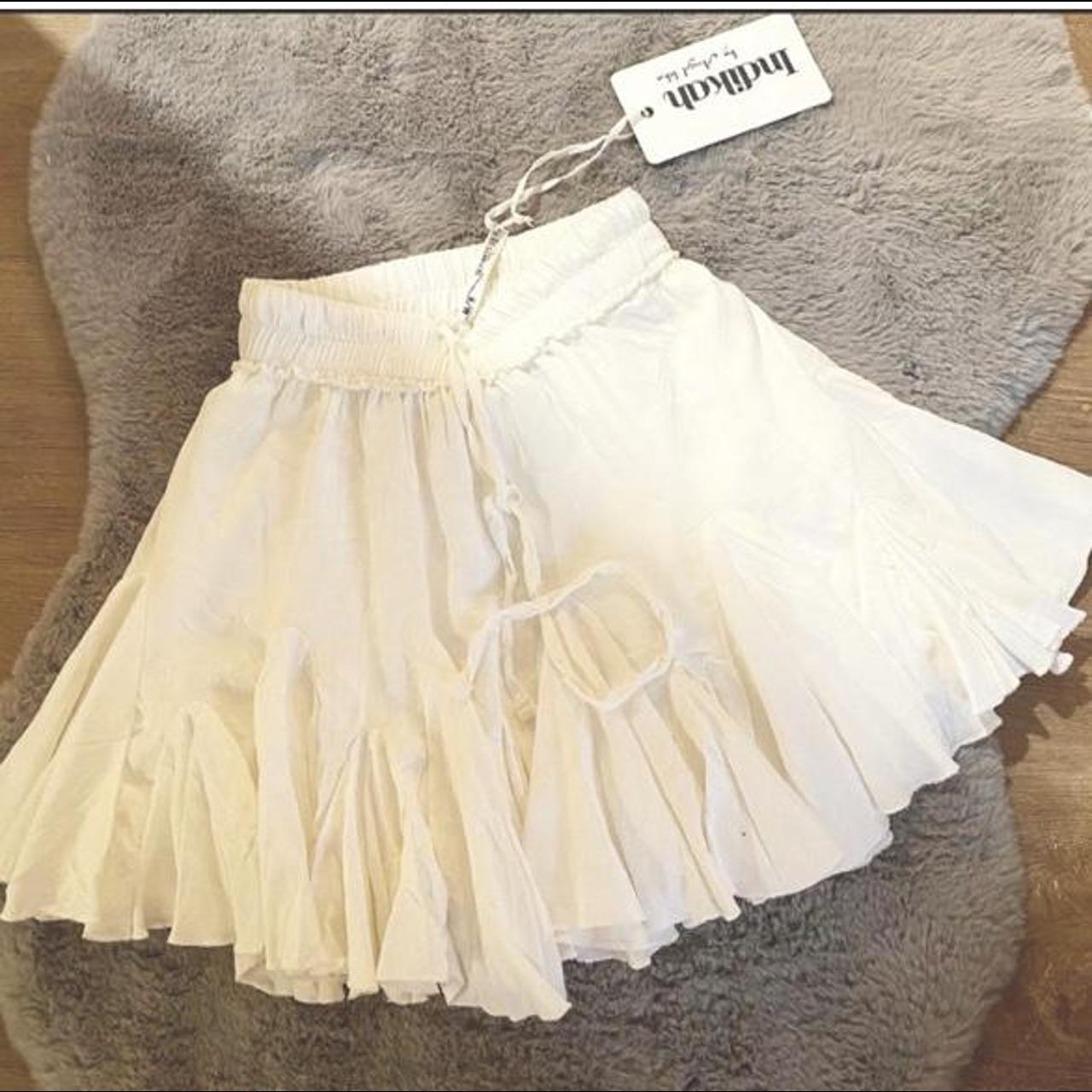 cute white skirt that is never worn, stretchy and... - Depop