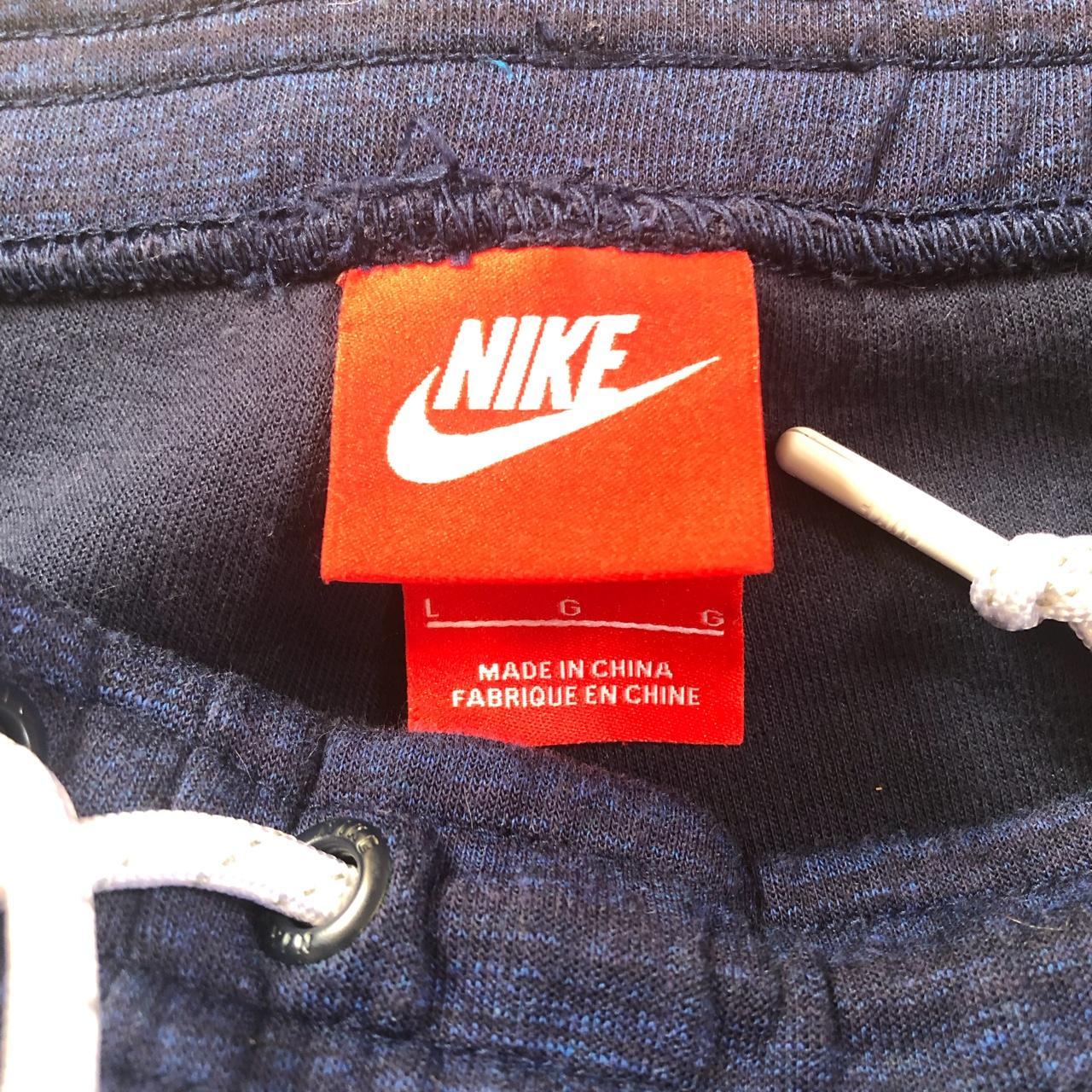 Nike Tech Fleece Joggers Large Blue with black... Depop