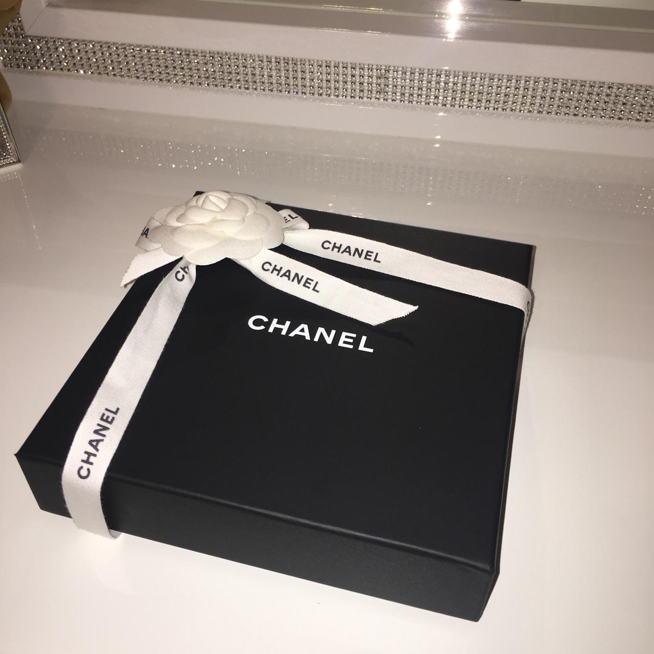 Selling this 100% authentic Chanel box with a ribbon