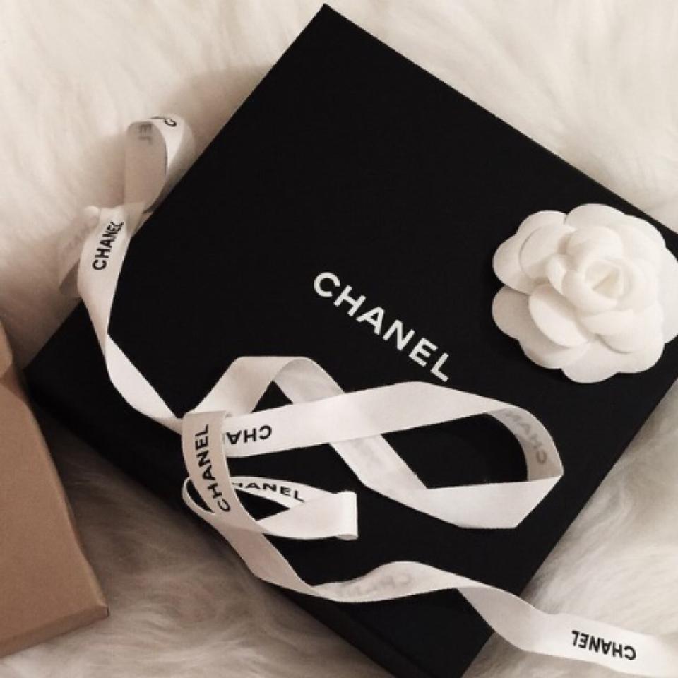Selling this 100% authentic Chanel box with a ribbon