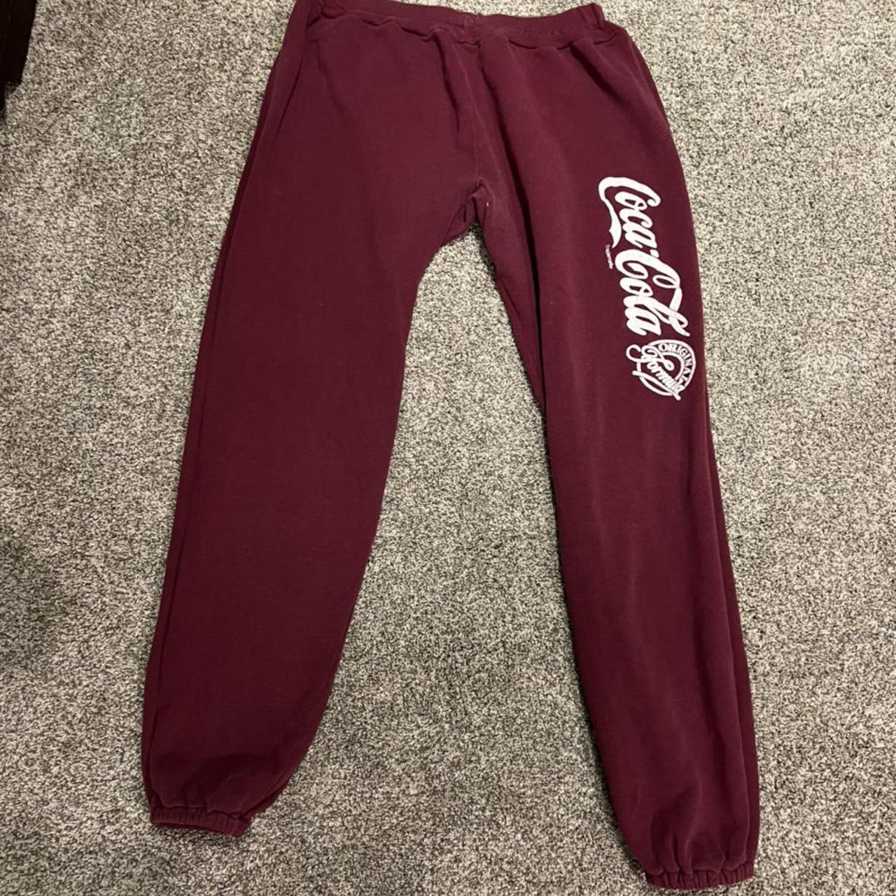 Vintage Coca-Cola sweat pants. There is a slight... - Depop