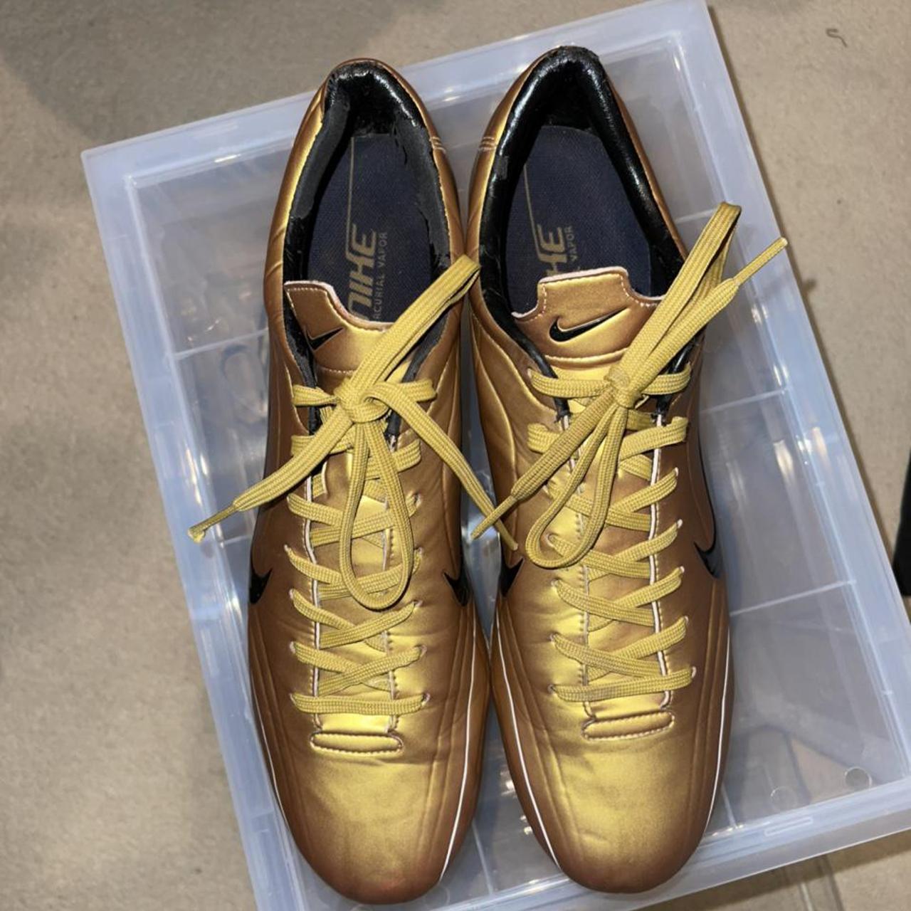 nike black gold boots