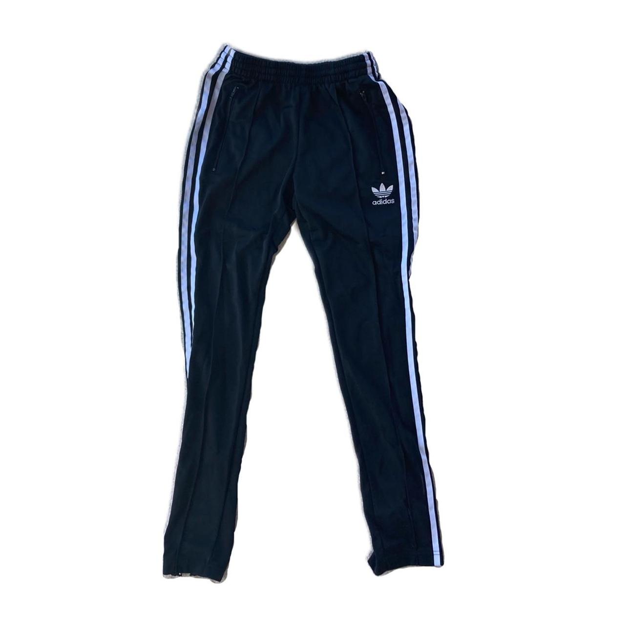 Adidas sweatpants, zippers at hem, elastic waistband... - Depop