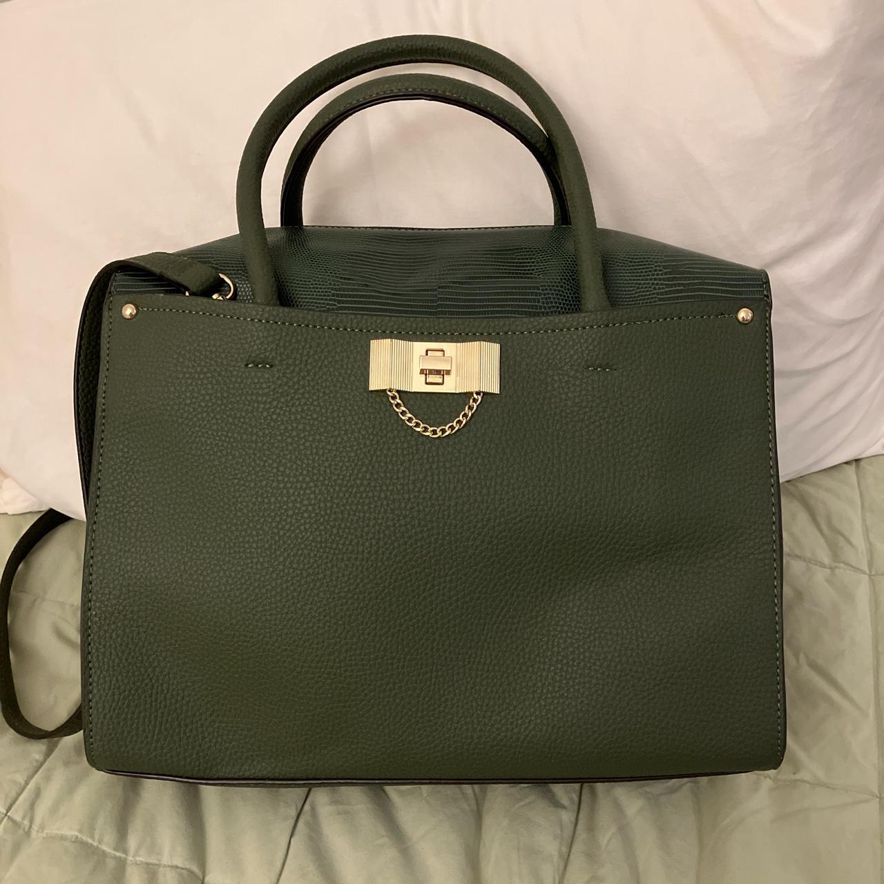 I love my first Strathberry bag, in bottle green. I thought I'd use it for  special occasions only but decided to take her mattress shopping today. 😍  The perfect minimal handbag for