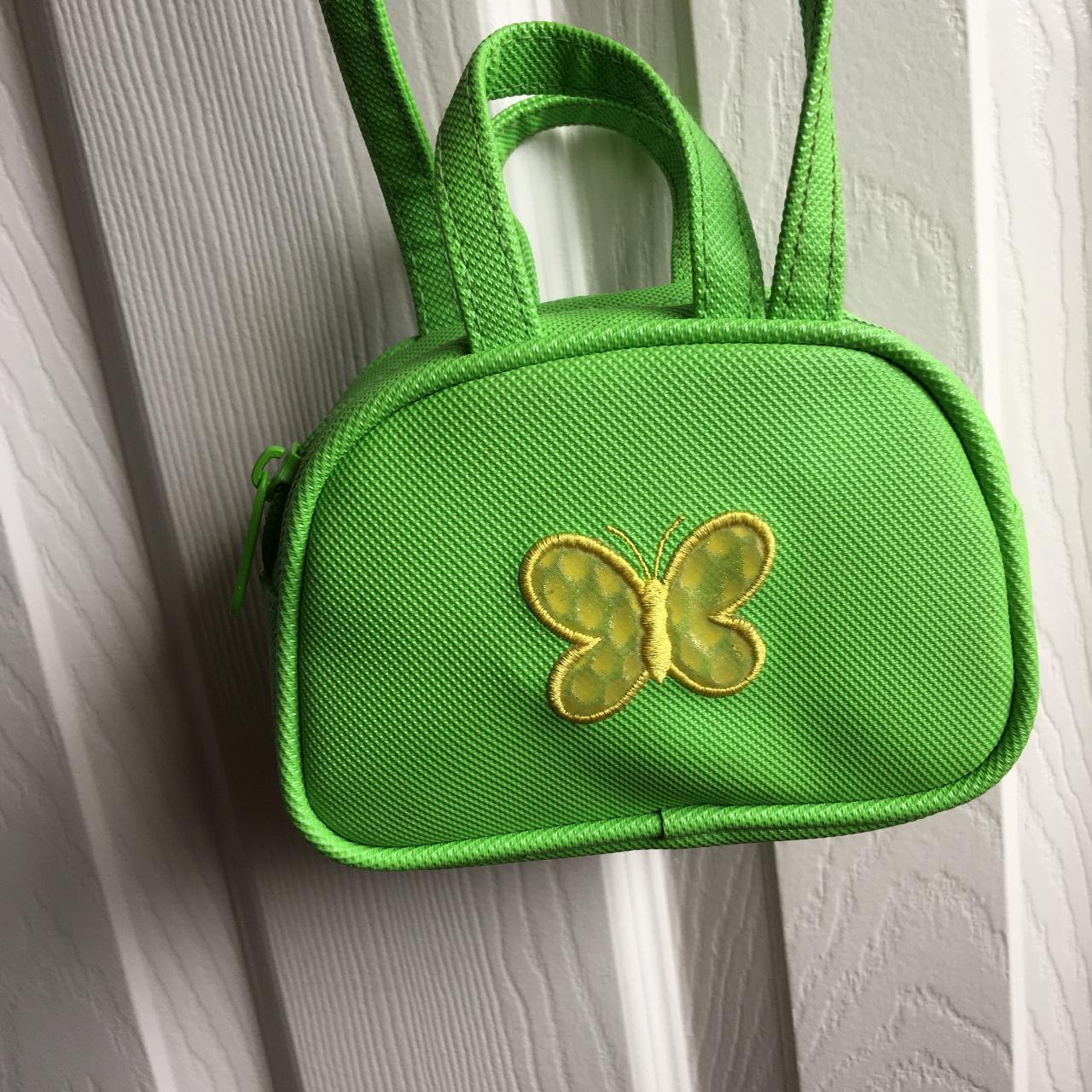 Green mini crossbody bag with embroidered yellow... Depop