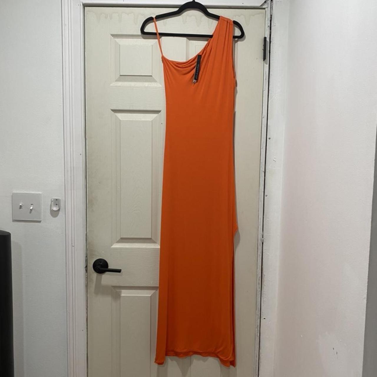 This dress has barley been worn. It has a slit on... - Depop