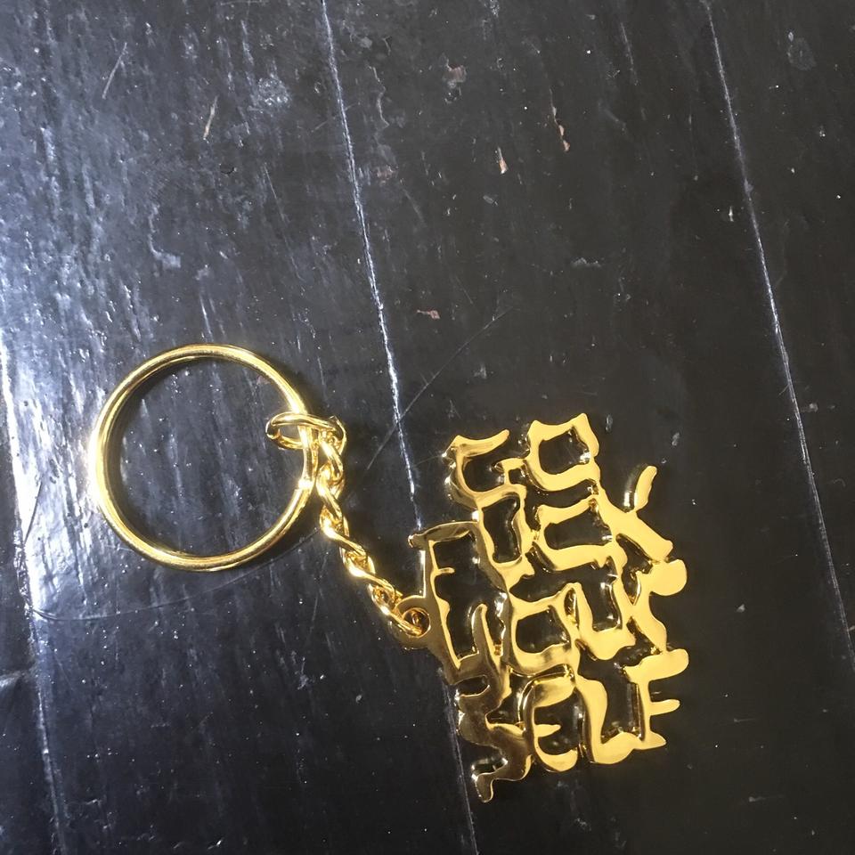 Supreme deals gold keychain