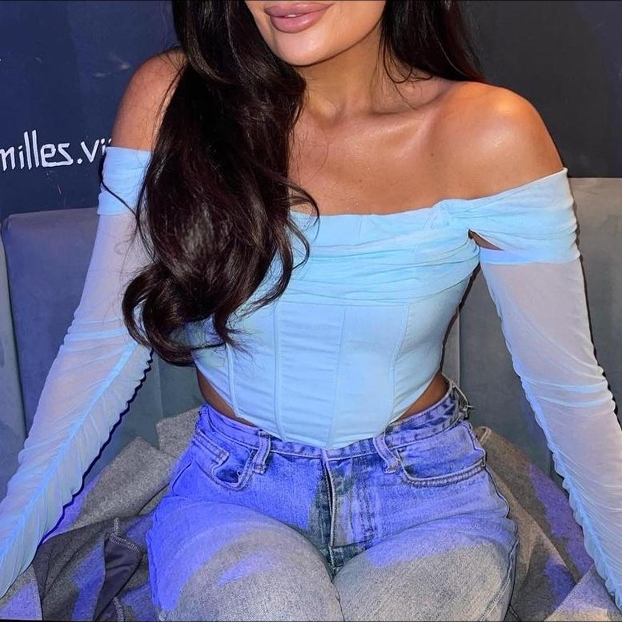 Aqua blue corset top with sheer sleeves, zip back... Depop