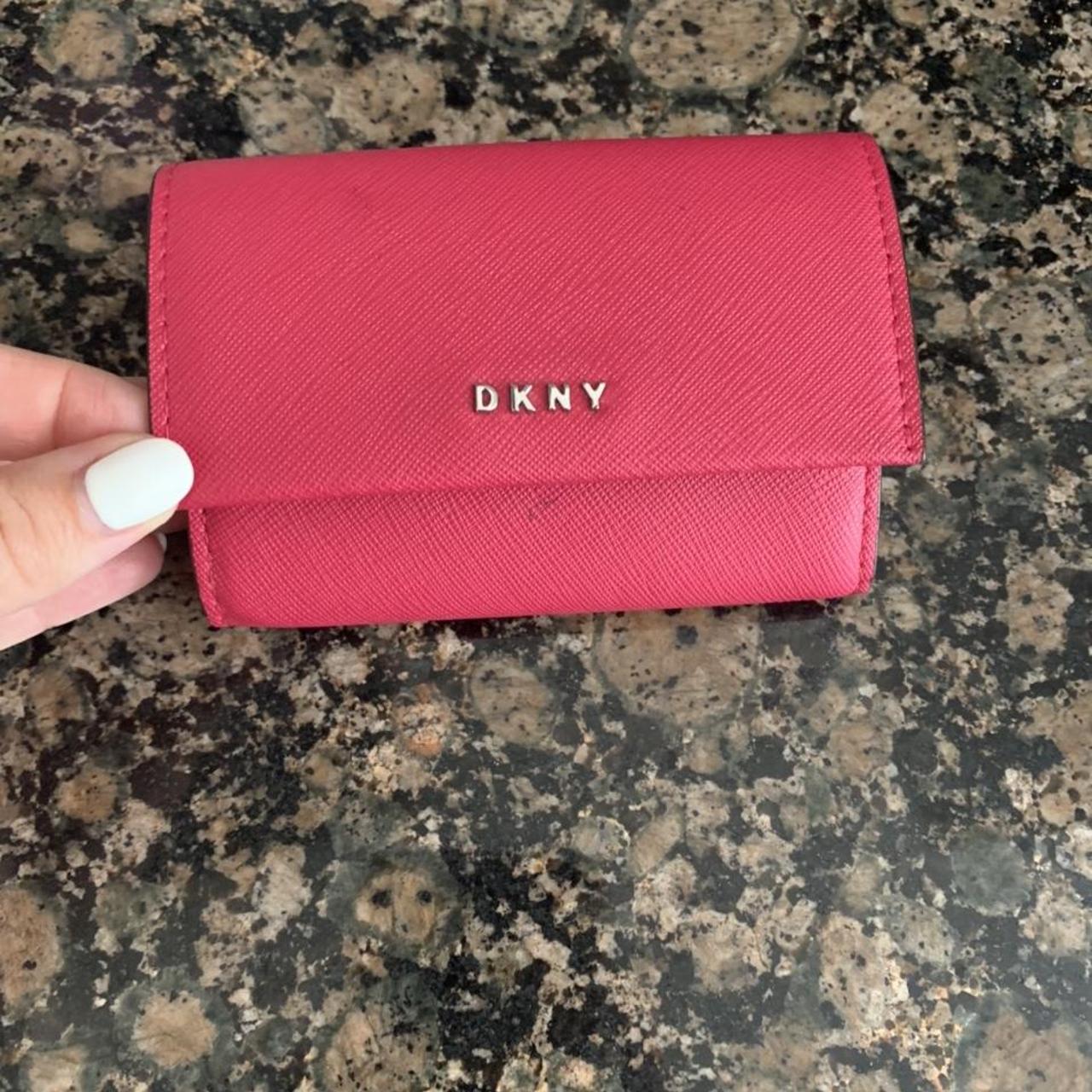 Pink DKNY purse. Has been used once but it has a... Depop