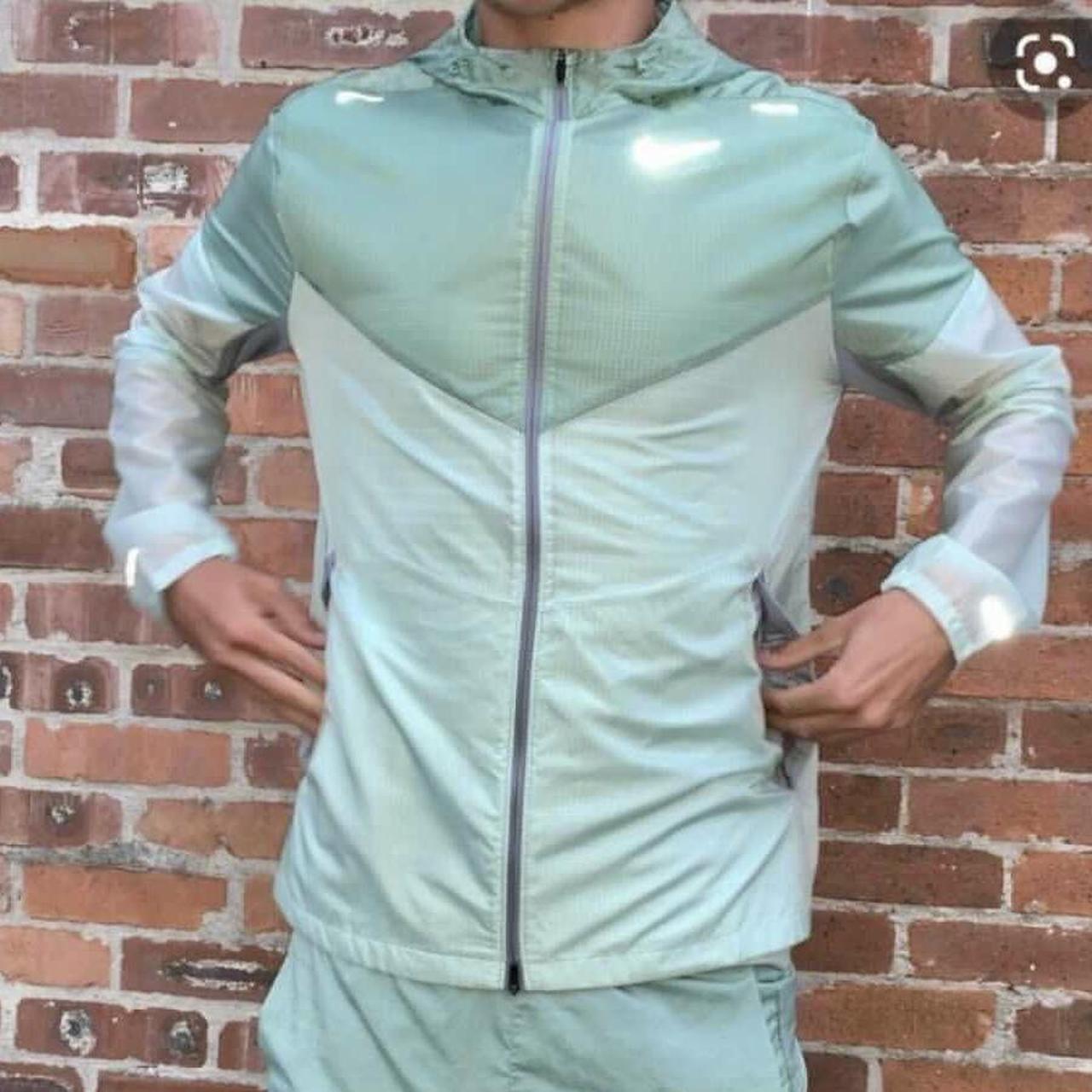 mint green nike windbreaker