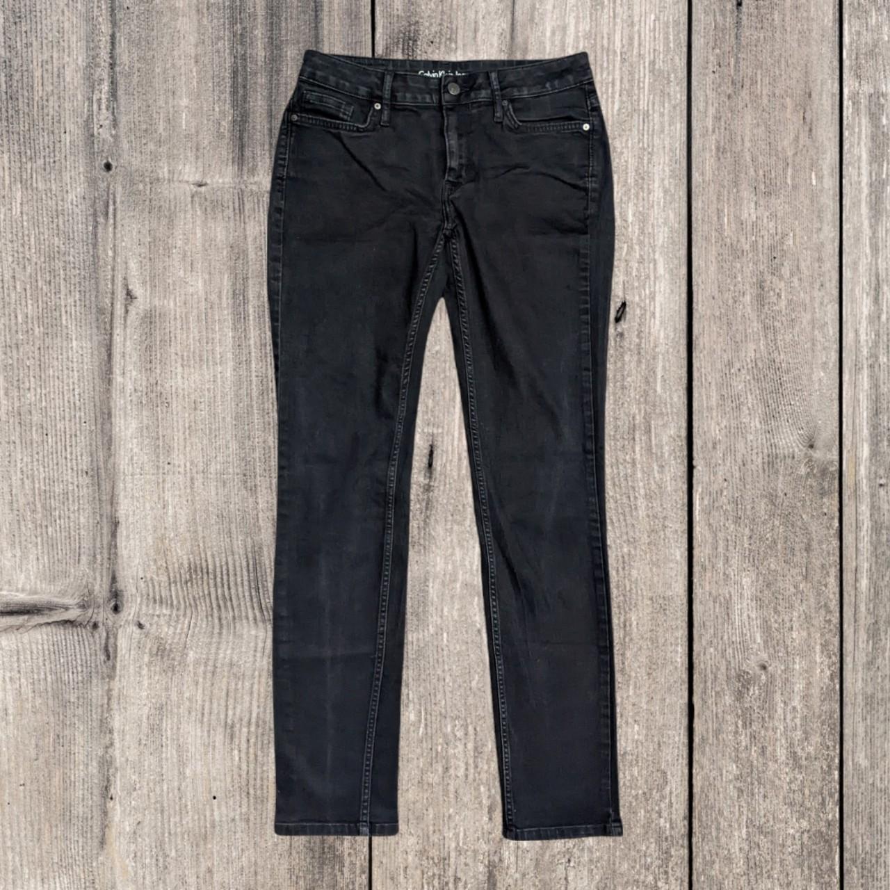 Women's Calvin Klein black jeans in an 'Ultimate... - Depop