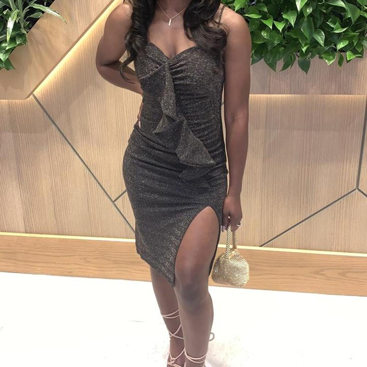 Black and gold speckled dress from Depop