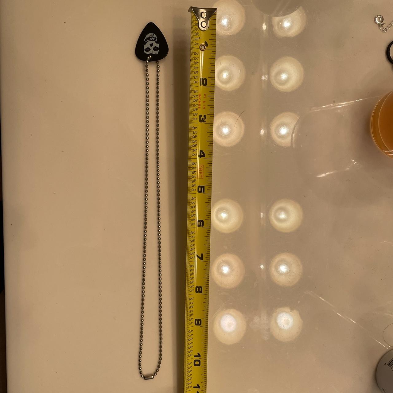 Ball chain necklace with Misfits guitar pick. The... Depop