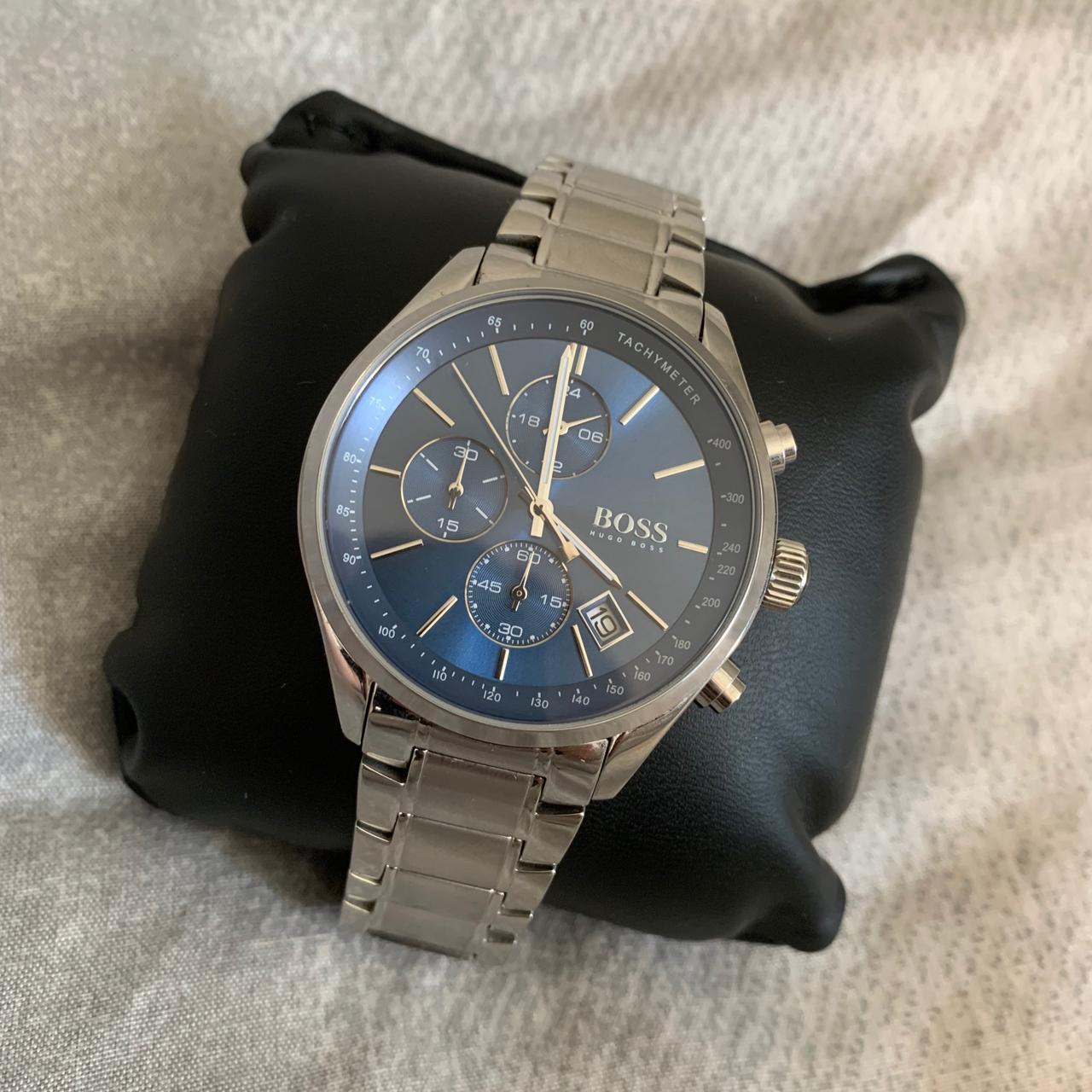 Mens silver and navy Hugo Boss watch, been worn... - Depop