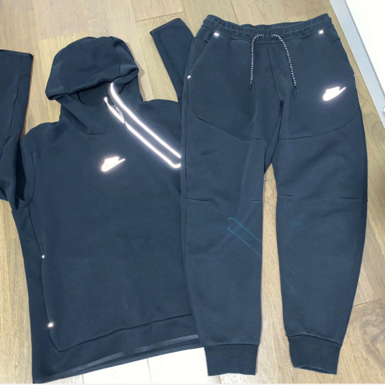 Blue nike best sale tech sweatsuit