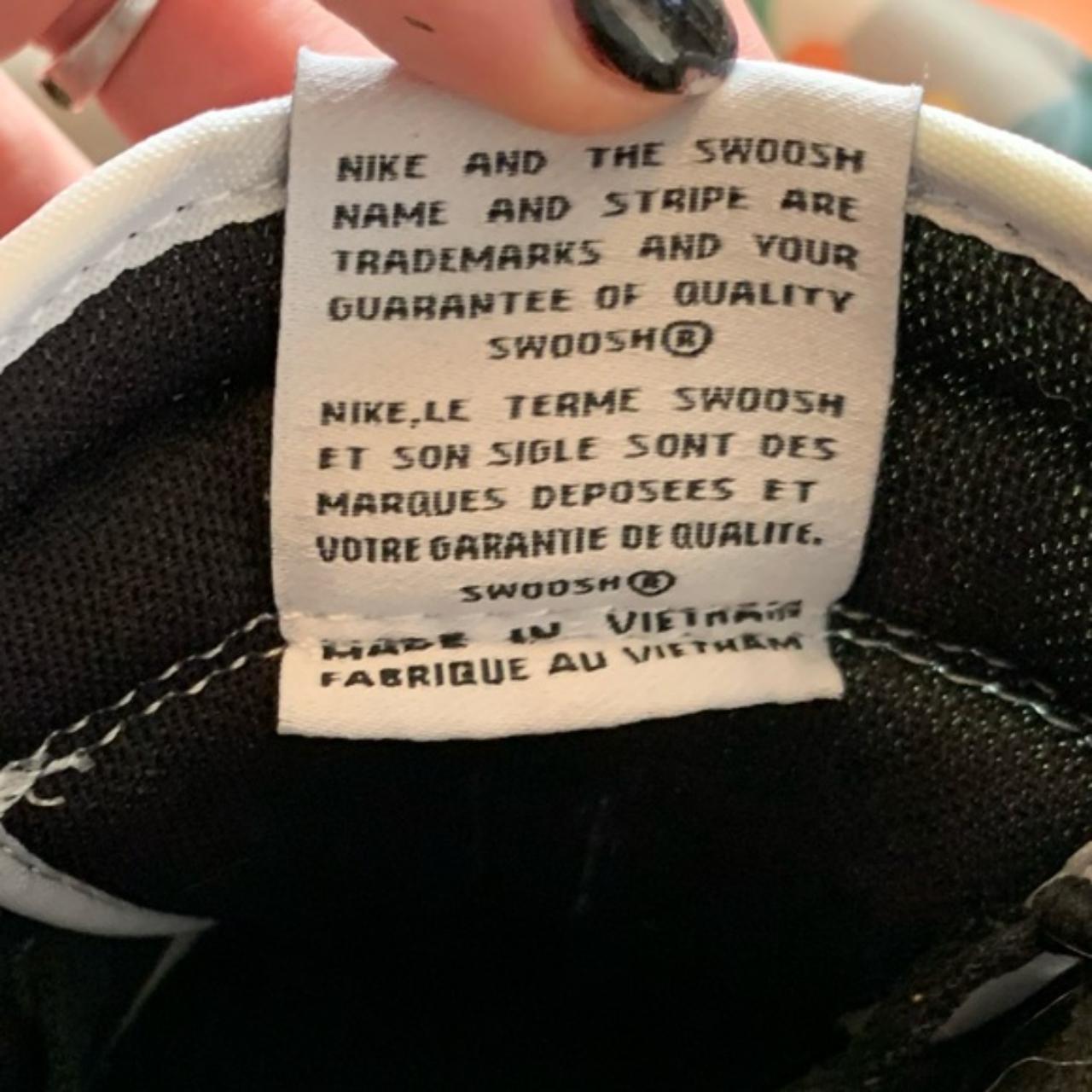 Nike and the swoosh shop name and stripes are trademarks