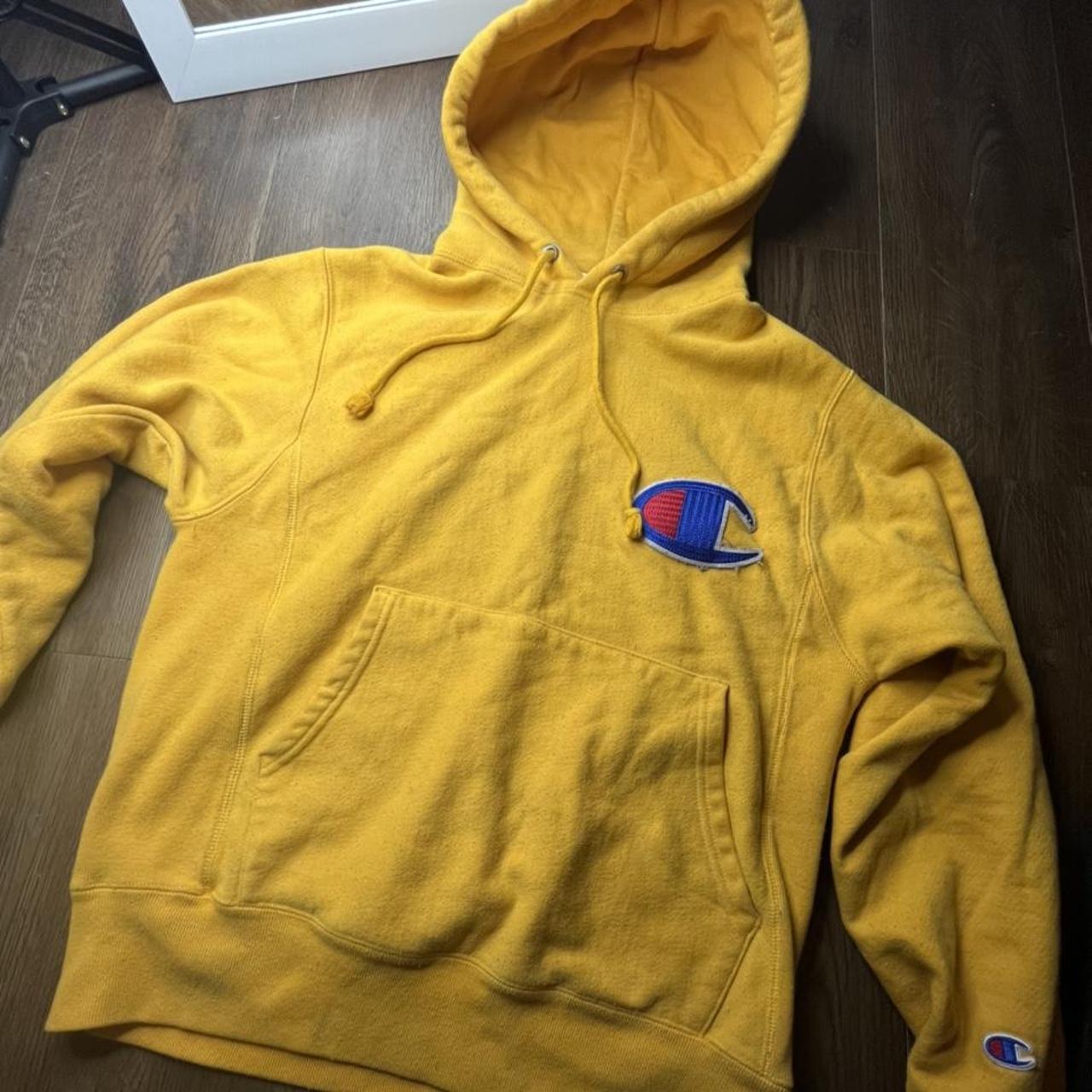 Bright yellow champion hoodie Size small in women s