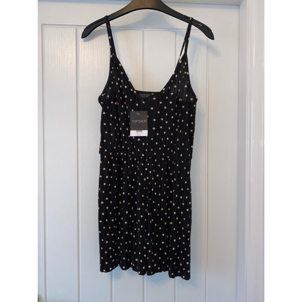 Topshop polka dot playsuit. Size 8 BNWT