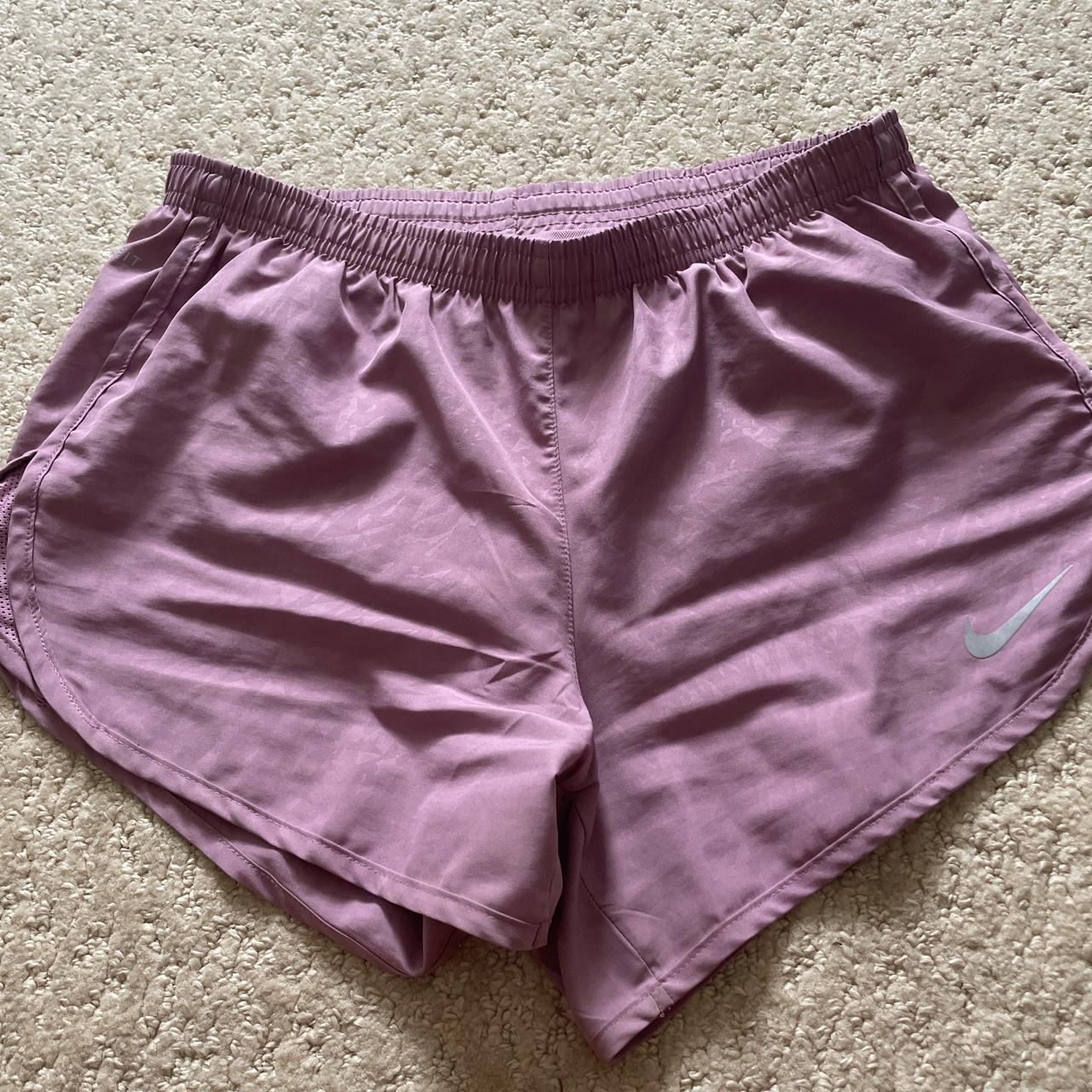light magenta drifit nike shorts!! zipper in... Depop