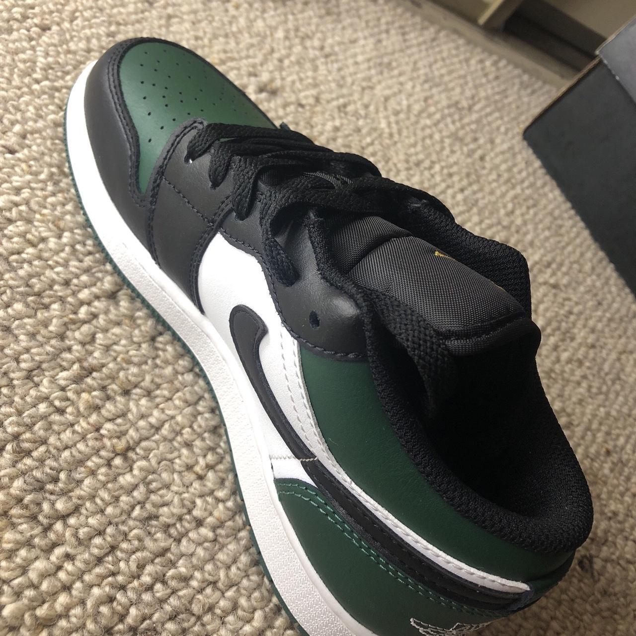 low top green jordans