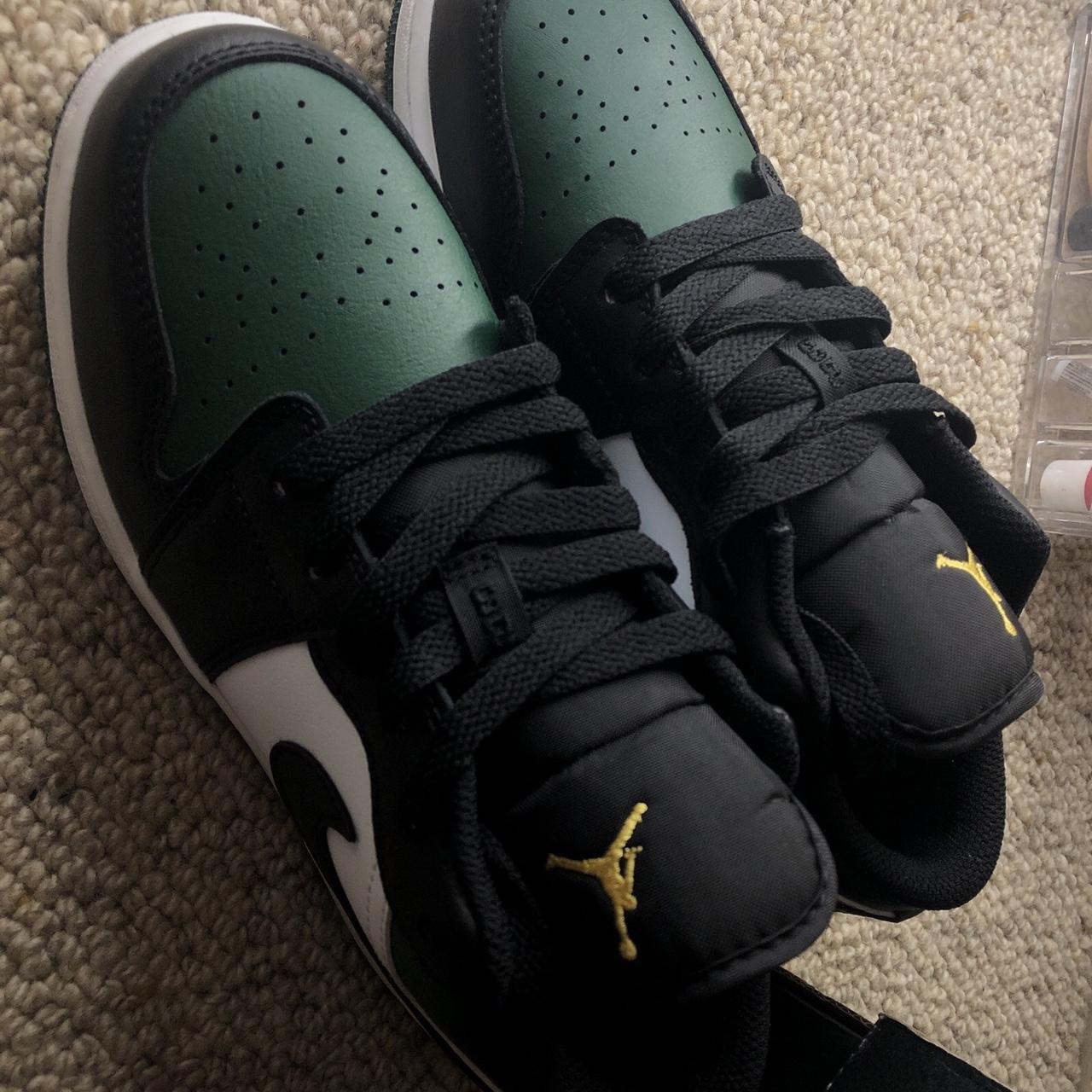 low top green jordans