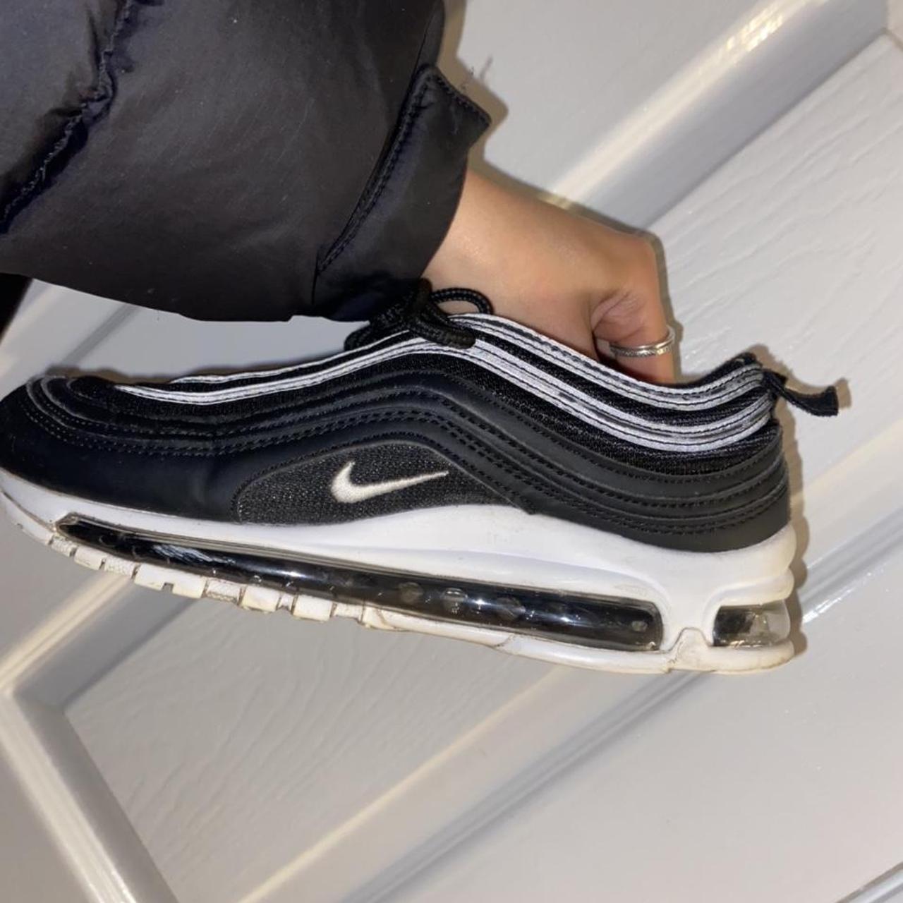 womens black nike 97