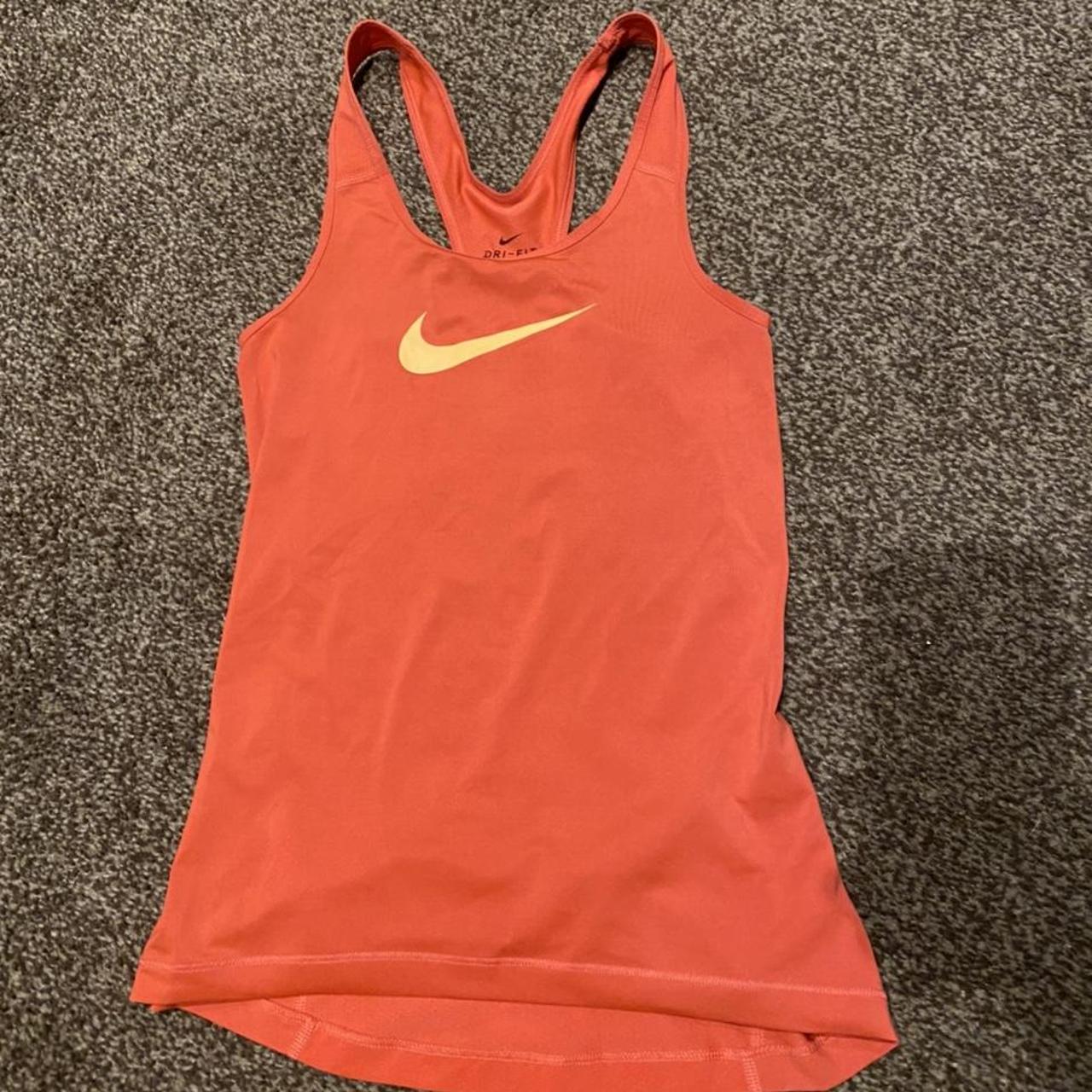 Nike DriFit womens gym vest orangey pink in... Depop