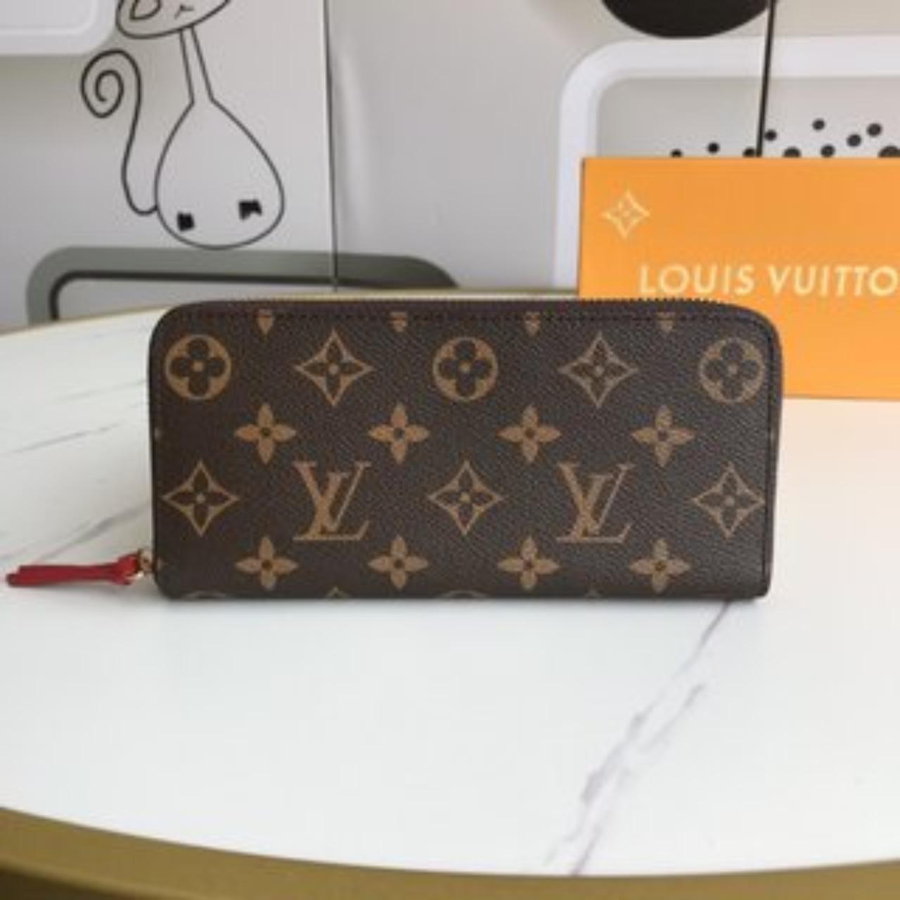 Louis Vuitton Zippy Wallet Canvas Wallet (pre-owned) in Brown
