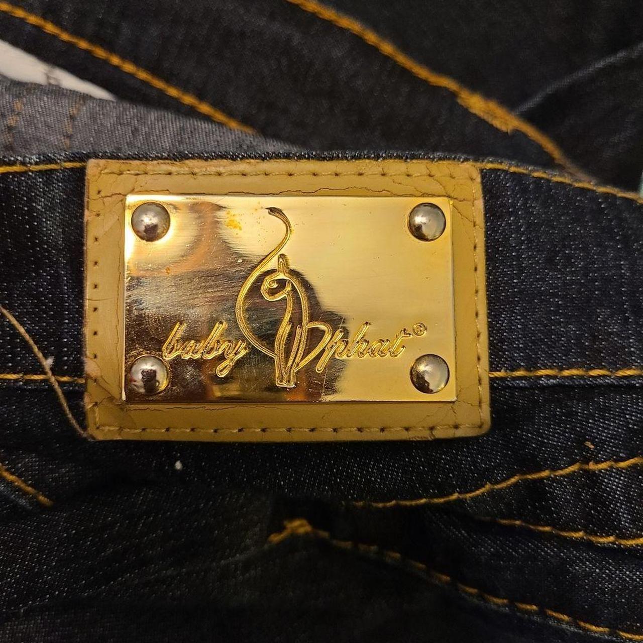 Baby Phat Y2k style jeans. Rise is approximately 8