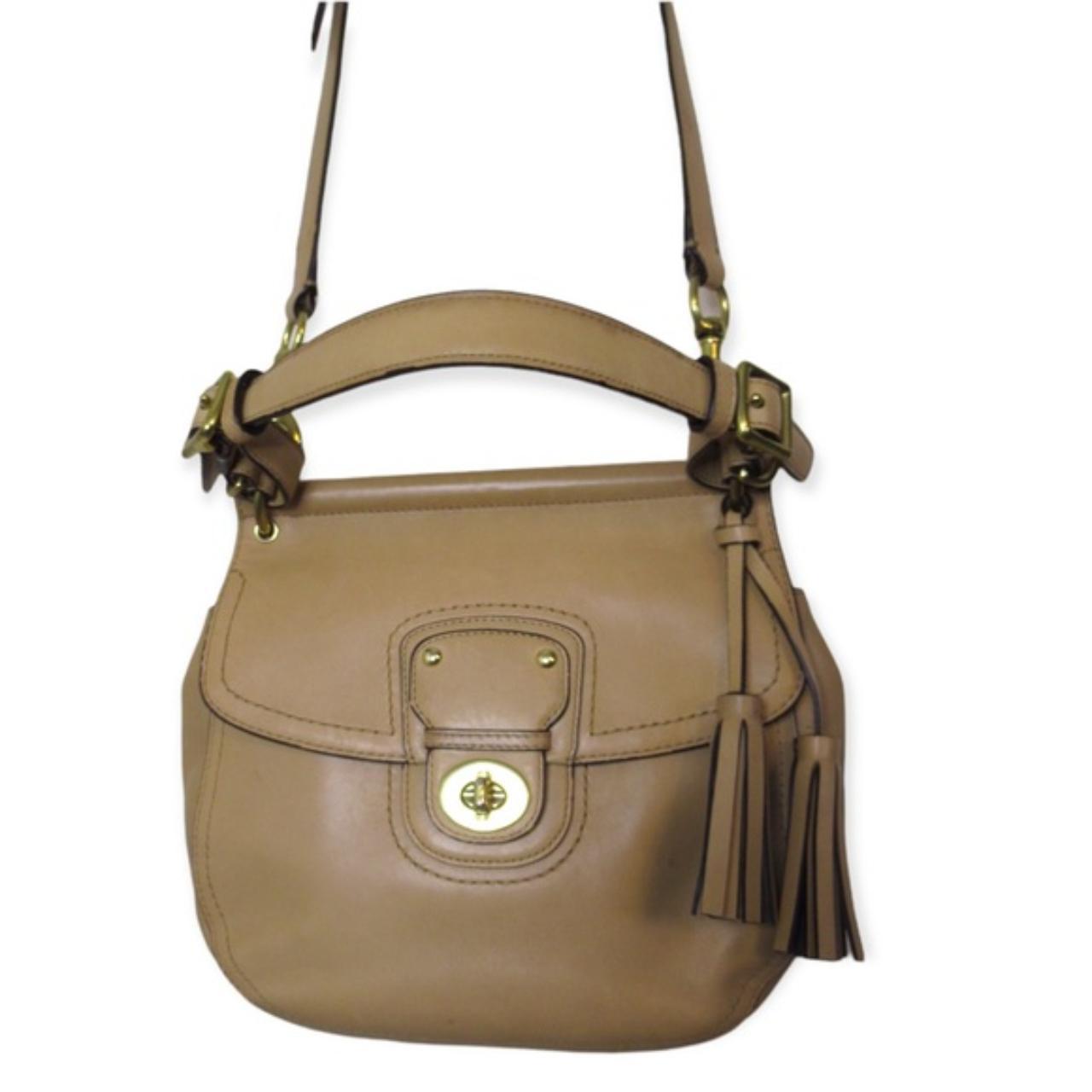 Coach Crossbody bag in a light beige. Serial number... Depop