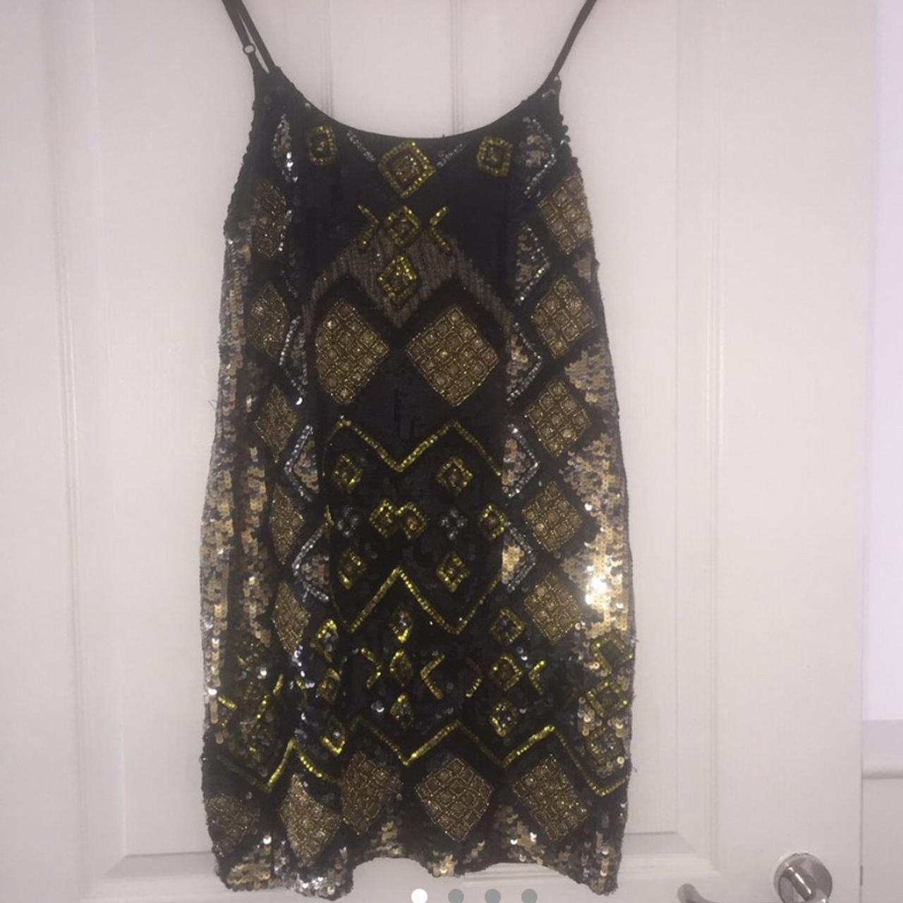Beautiful black and gold sequin dress in size 12... - Depop