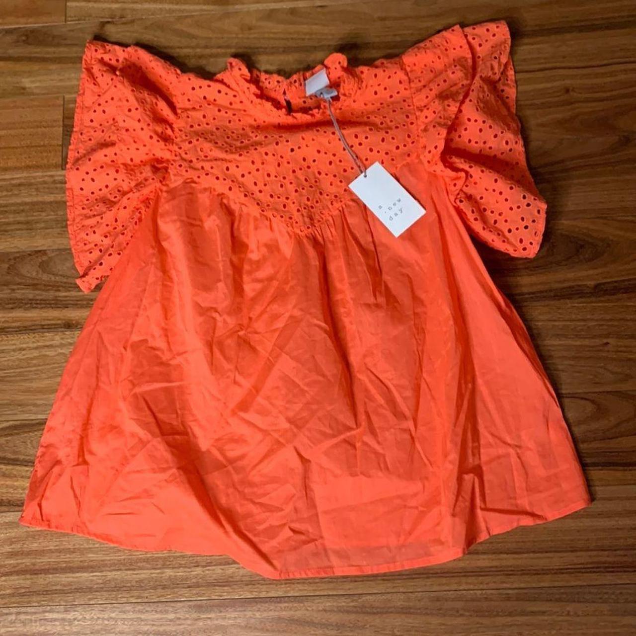 Beautiful coral top with keyhole back and butterfly... - Depop