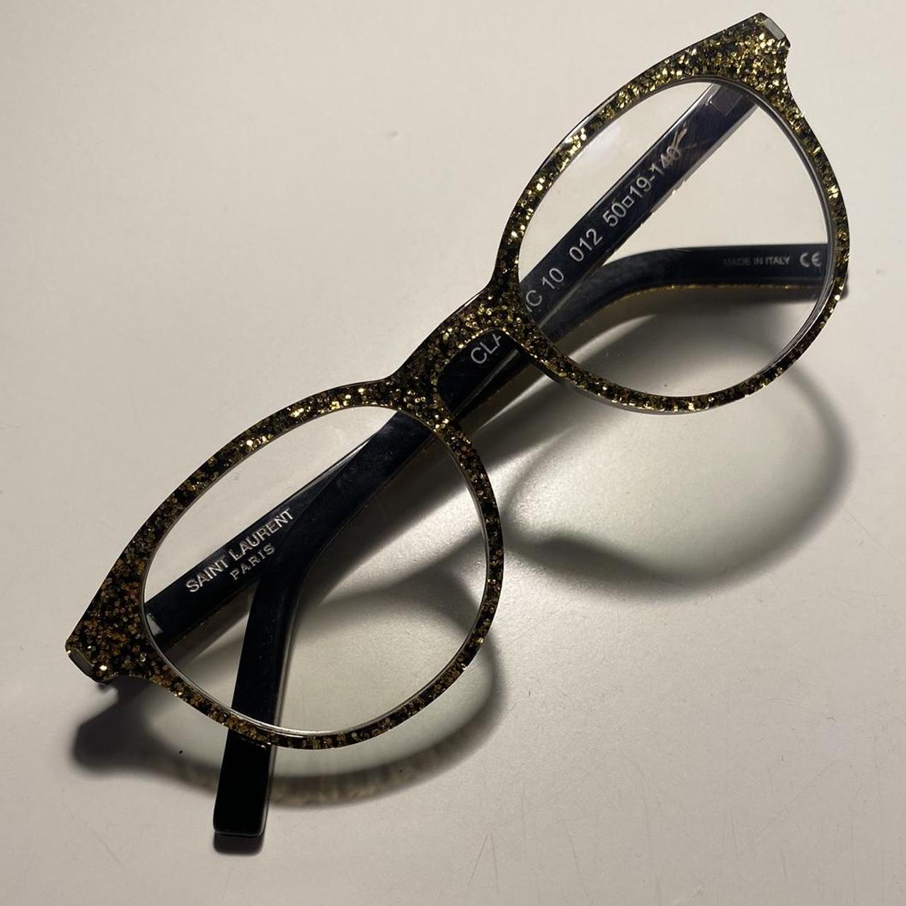 Saint Laurent (YSL) gold and black glitter glasses... Depop