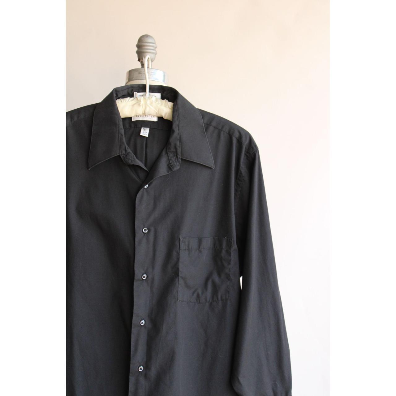 This is a classic black button down shirt that would... - Depop