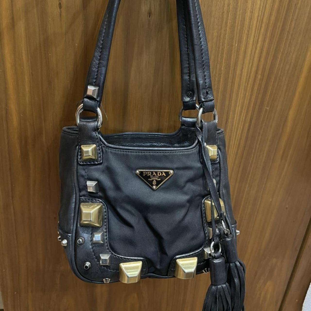 Prada Women's Black and Gold Bag | Depop