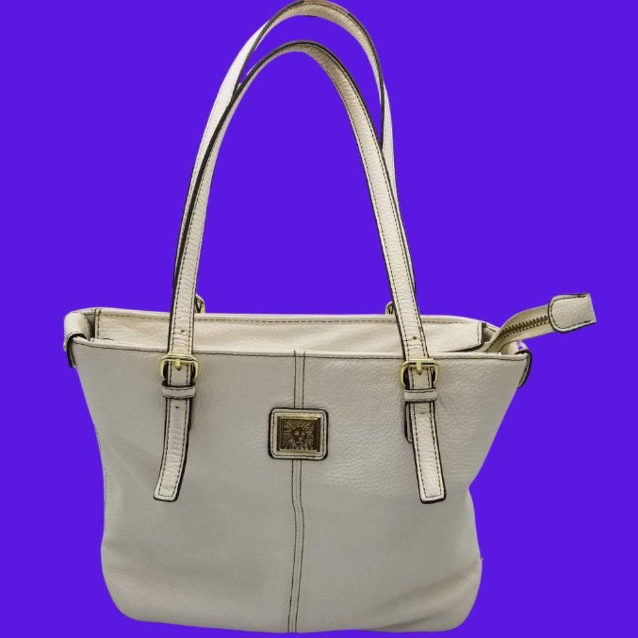 This white tote bag has plenty of pockets... Depop