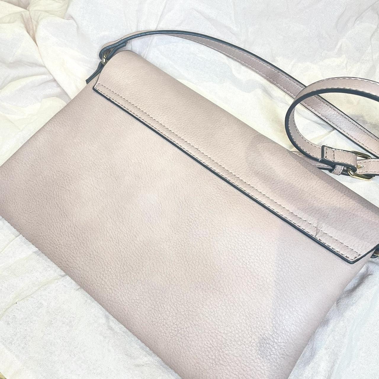 Oasis’s crossbody bag in light pink boasts timeless... Depop